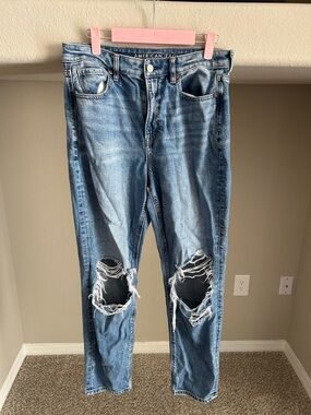 American Eagle Outfitters Women’s Light Blue High-Rise Distressed Jeans